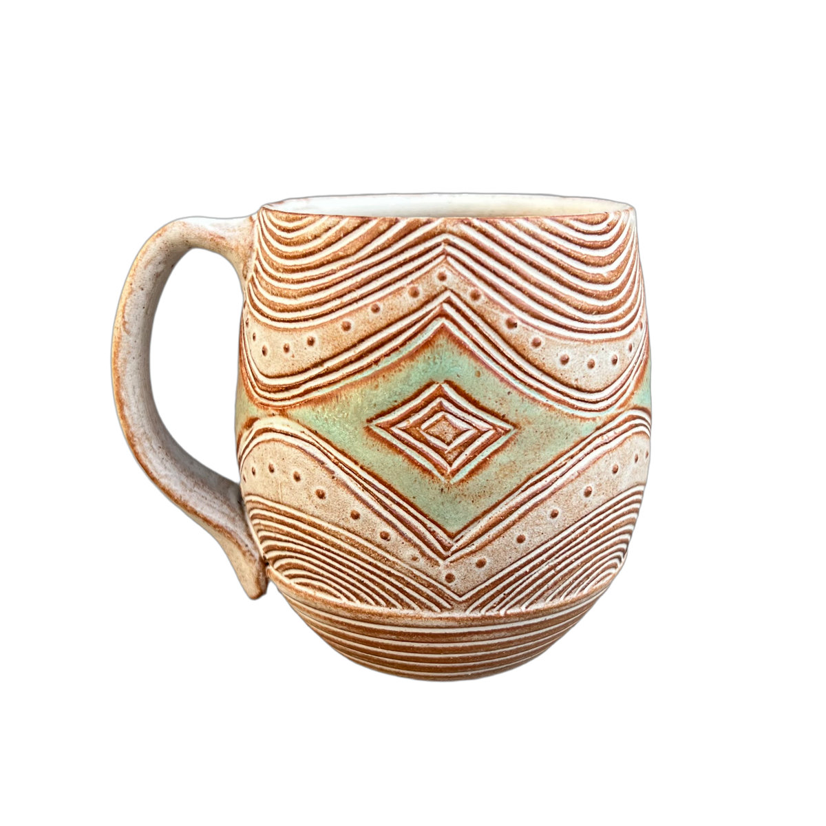 彫刻されたコーヒーカップ