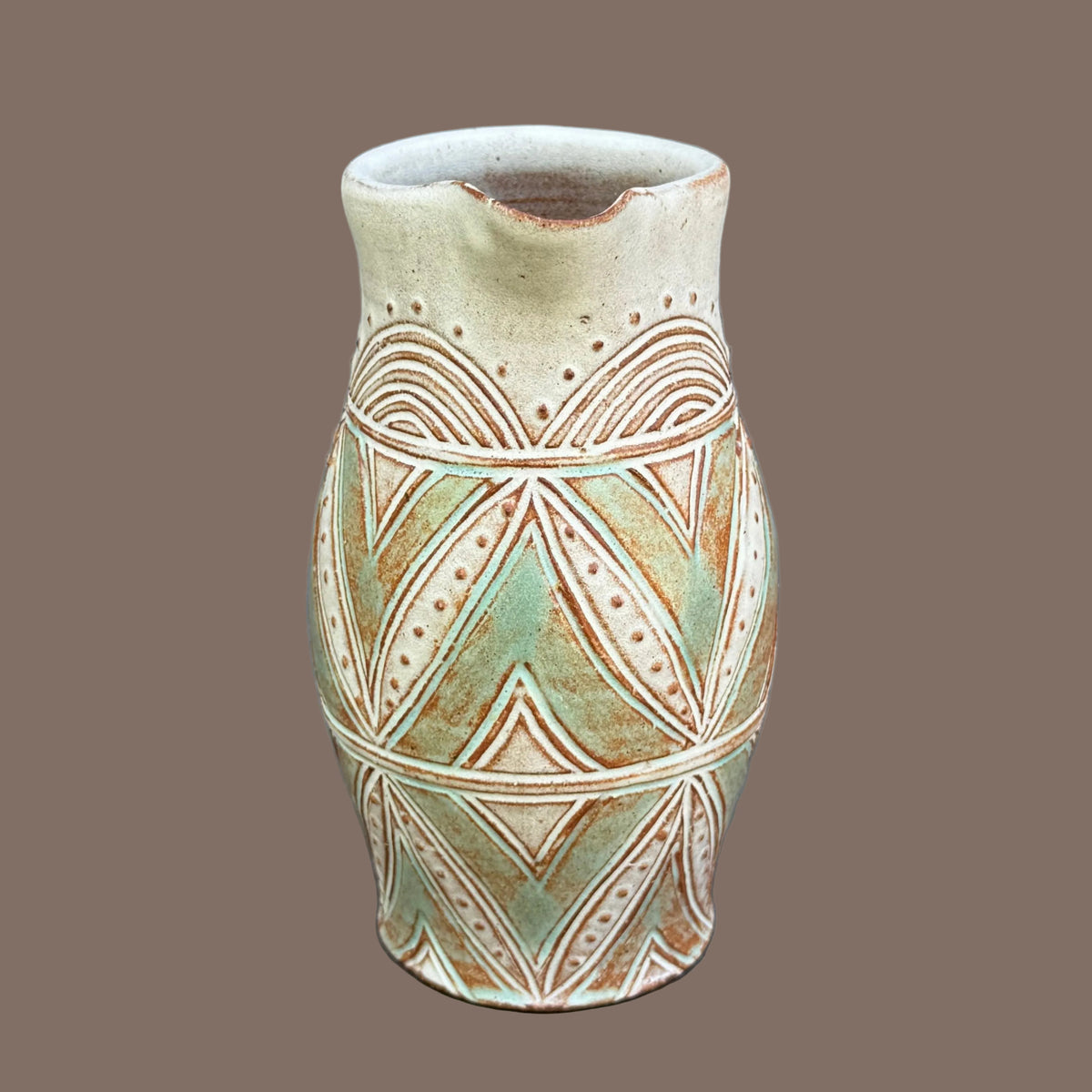 Small Carved Pitcher