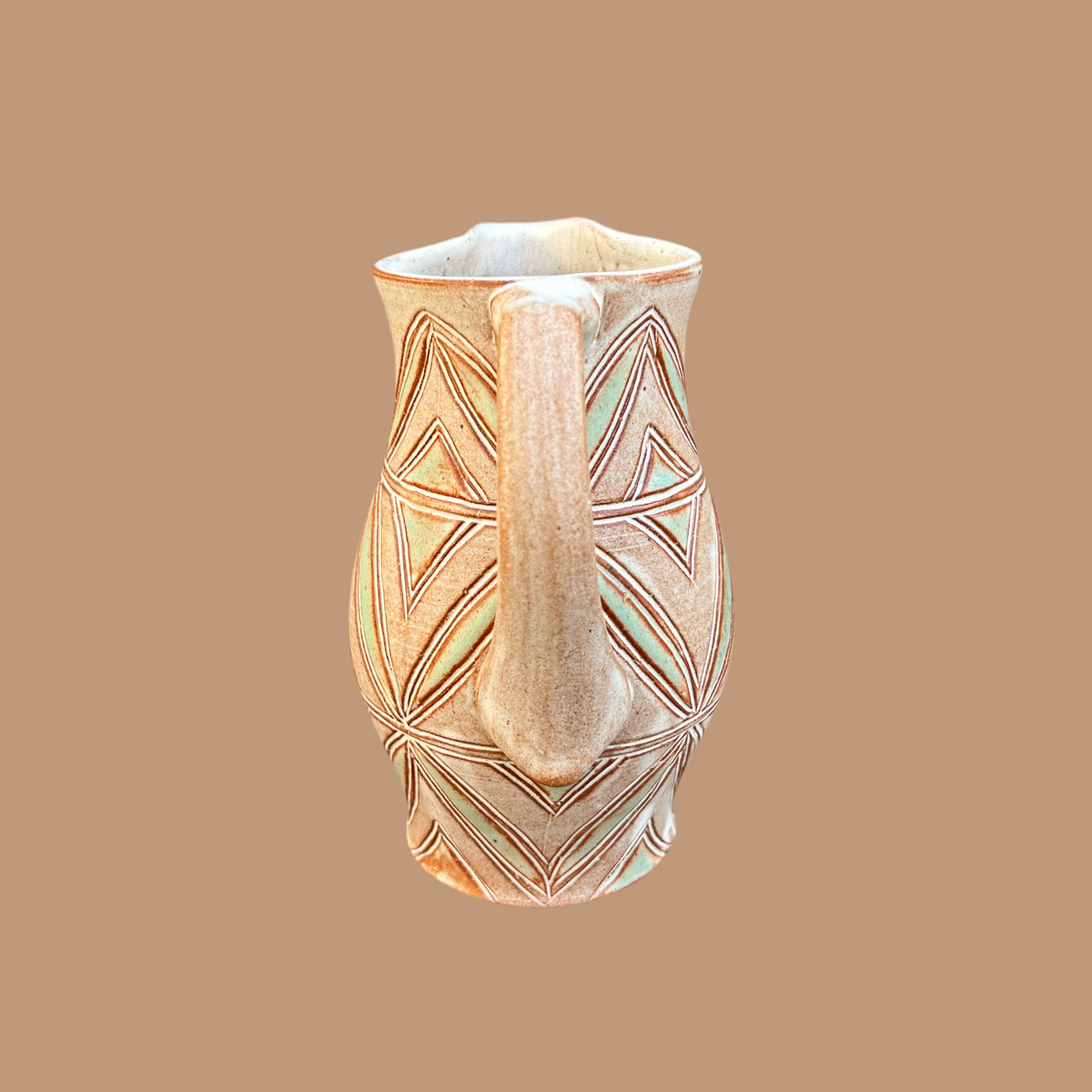 Small Carved Pitcher