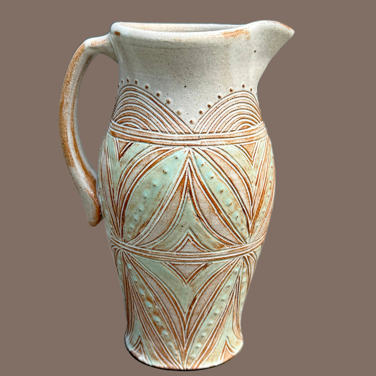 Carved Pitcher